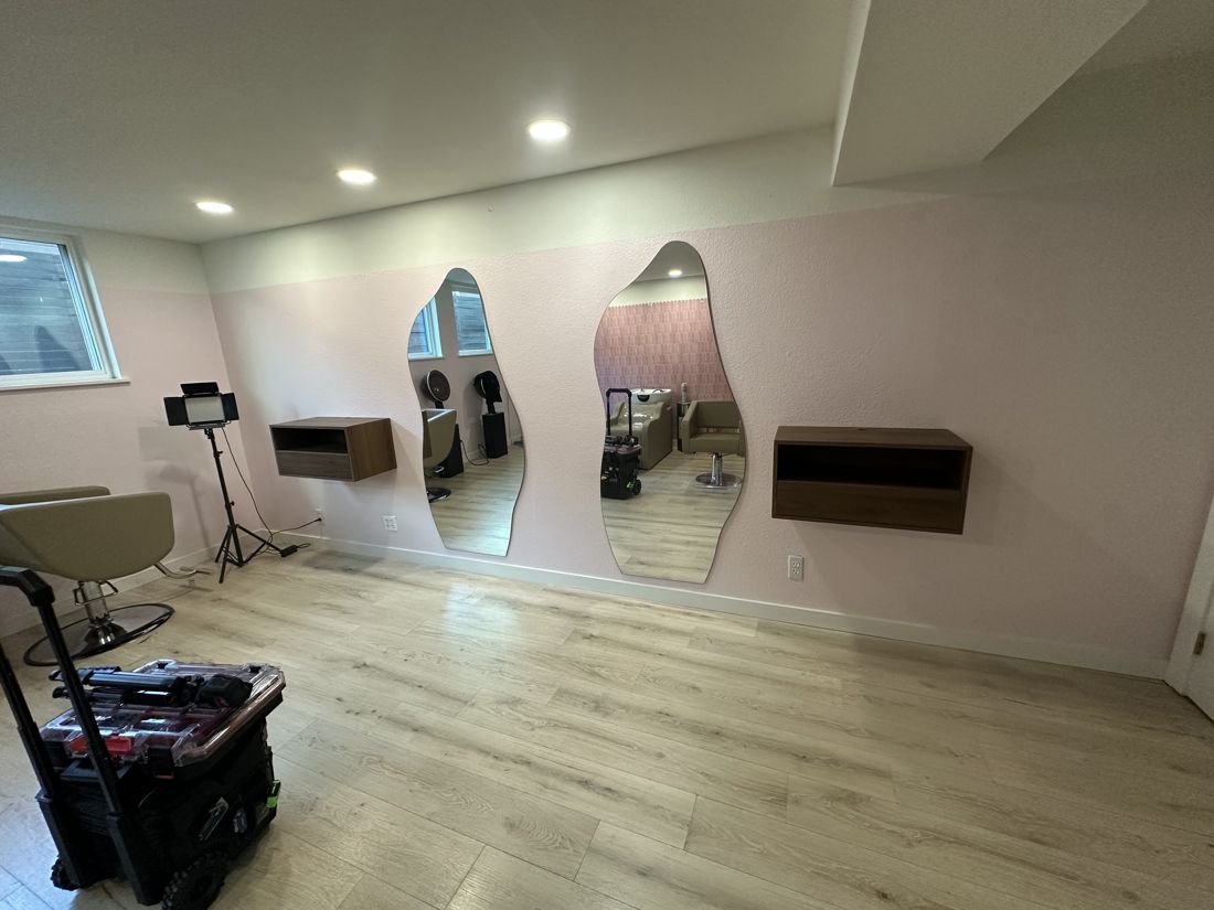 Salon wall mirrors and floating shelves